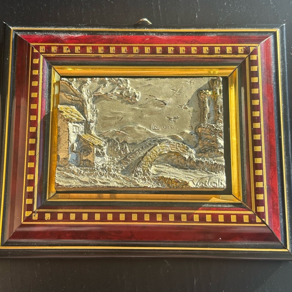 925 sterling silver Italian Creazioni Artistiche plaque in a wooden frame.